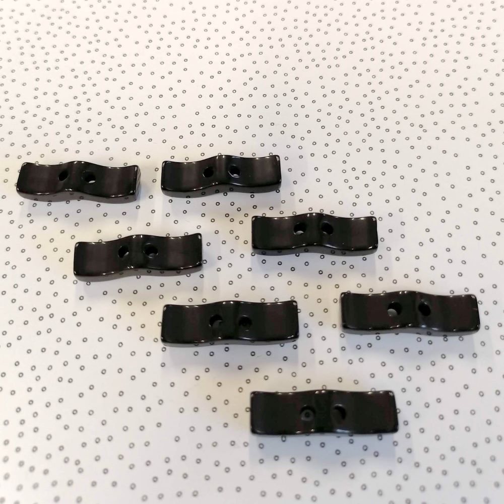 Plastový knoflík ~ 24x7 mm ~ černý